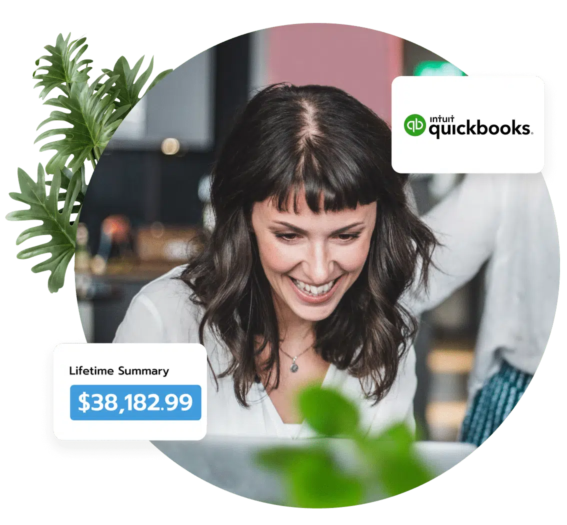 Smiling woman at computer