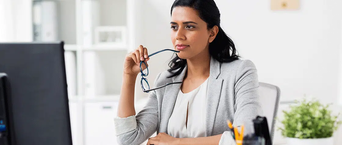 woman looking at a computer