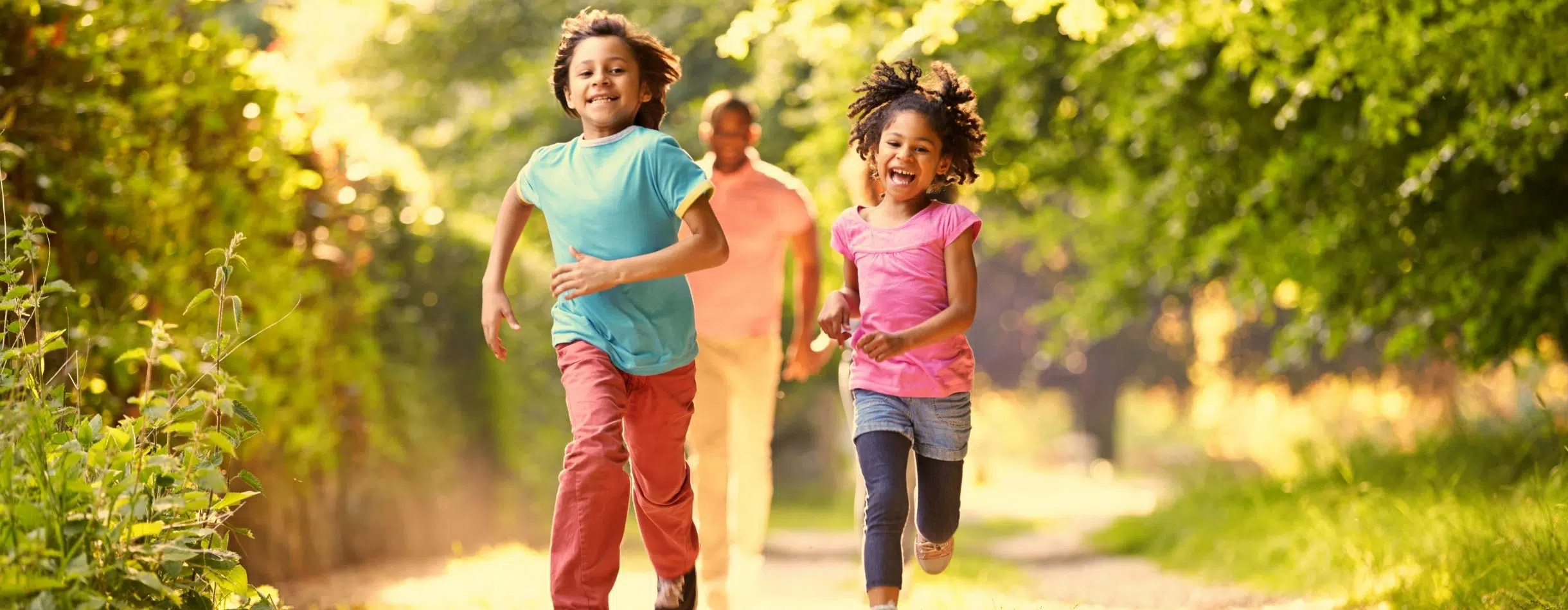 Children running in a field