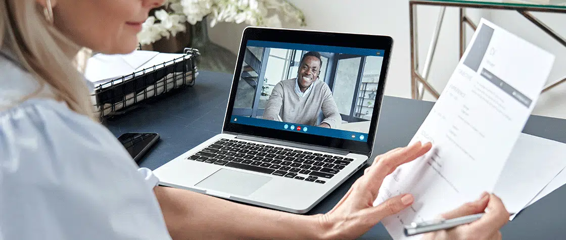 man being interviewed over Zoom