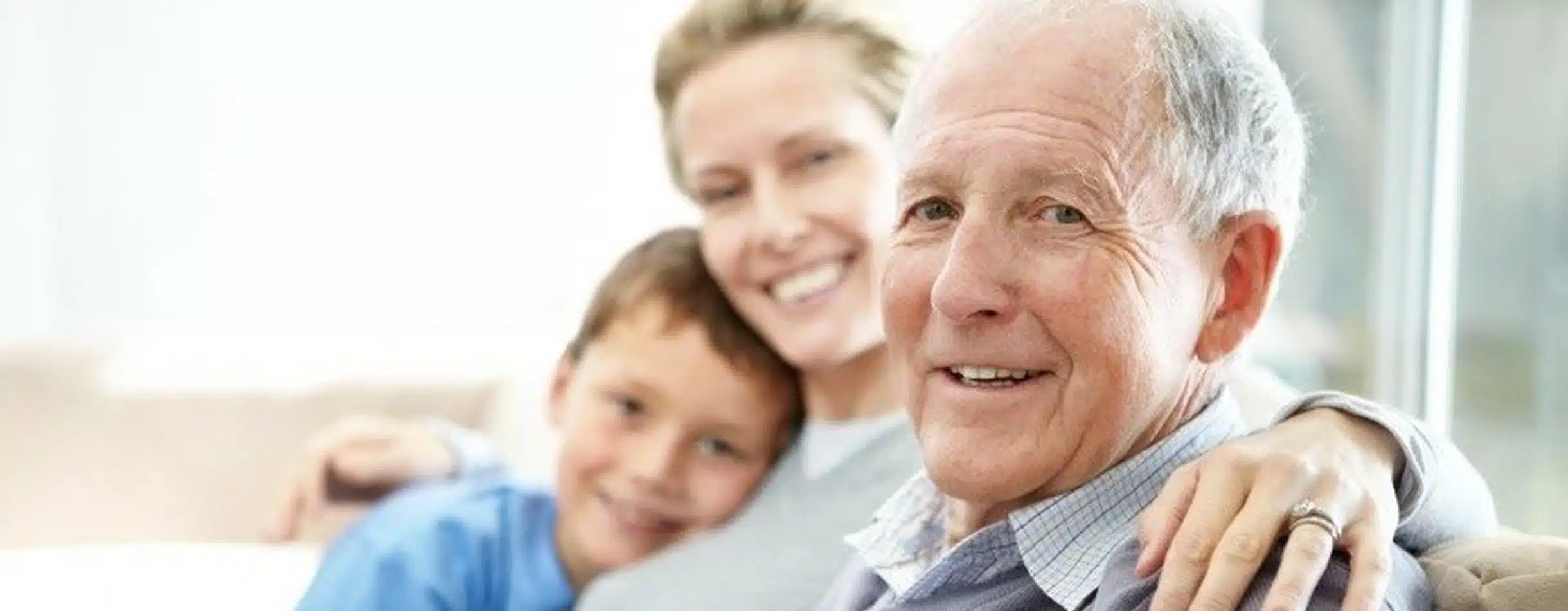 Image of a man with their child and grandchild