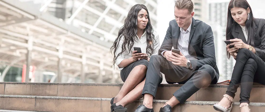 young employees on their phones