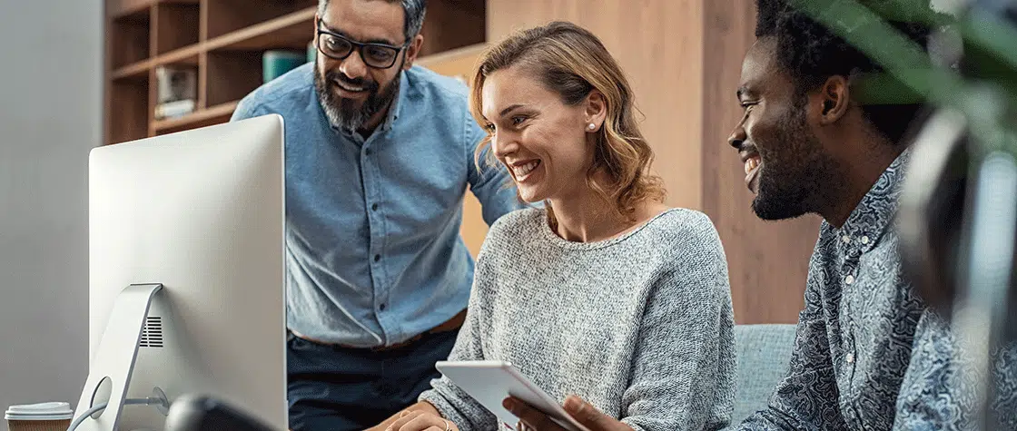 people having a meeting around computer