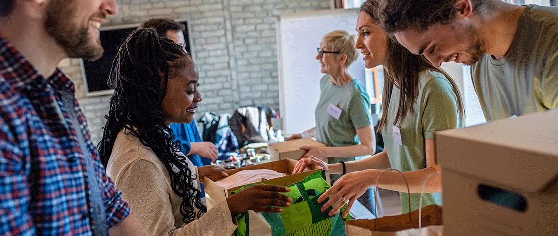 volunteers packing boxes